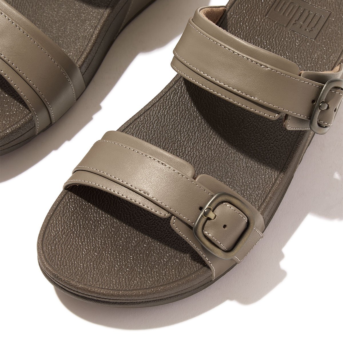 FitFlop LULU Adjustable Leather Slides Plummy front view
