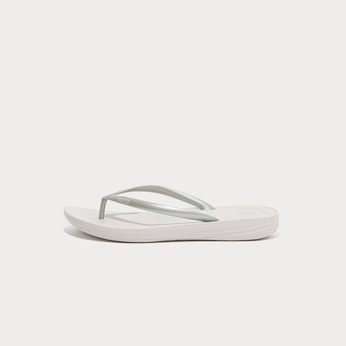 FitFlop iQUSHION Ergonomic Flip-Flops Silver front view